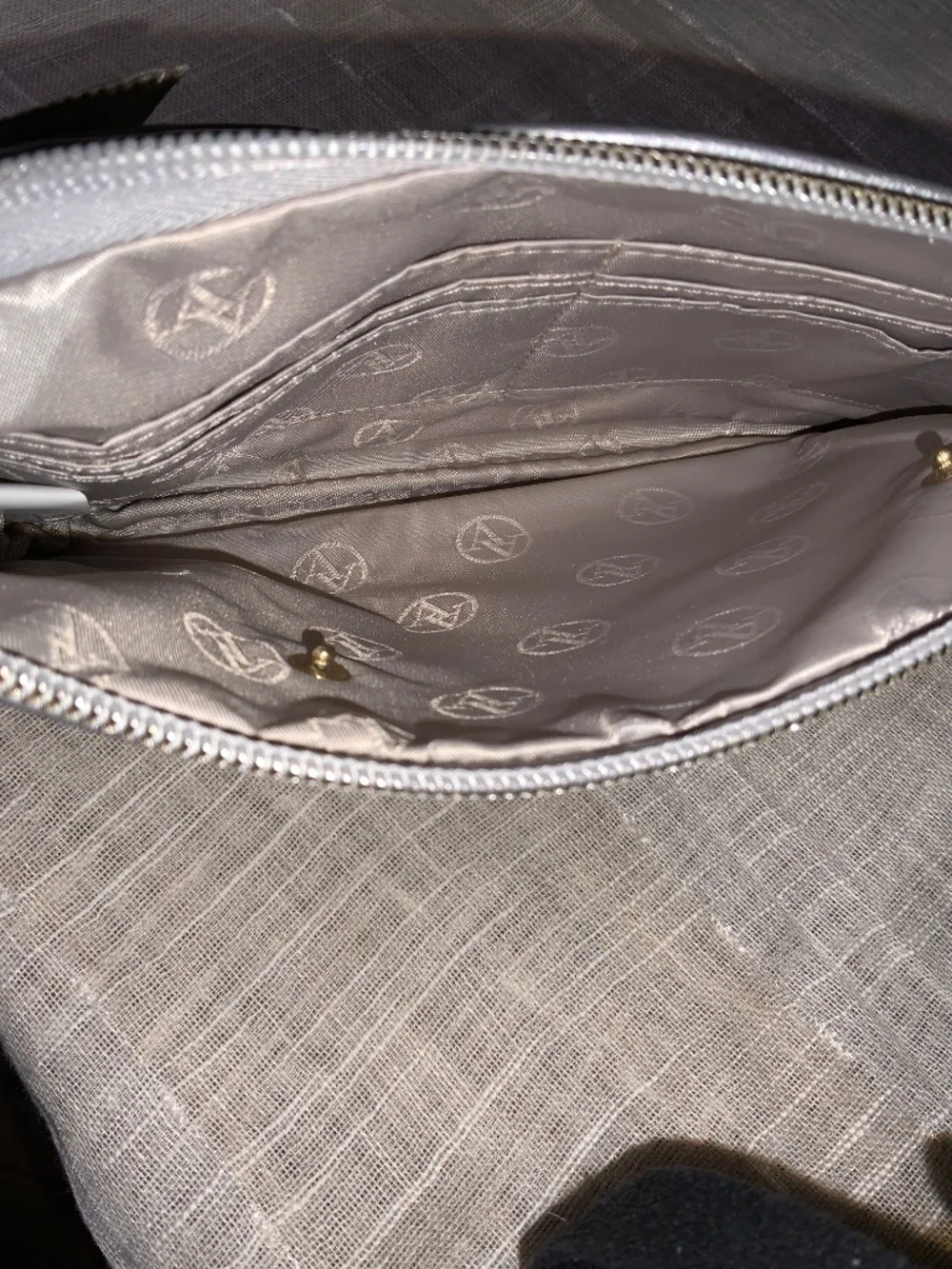 Adrienne Vittadini Silver charging wallet-wristlet